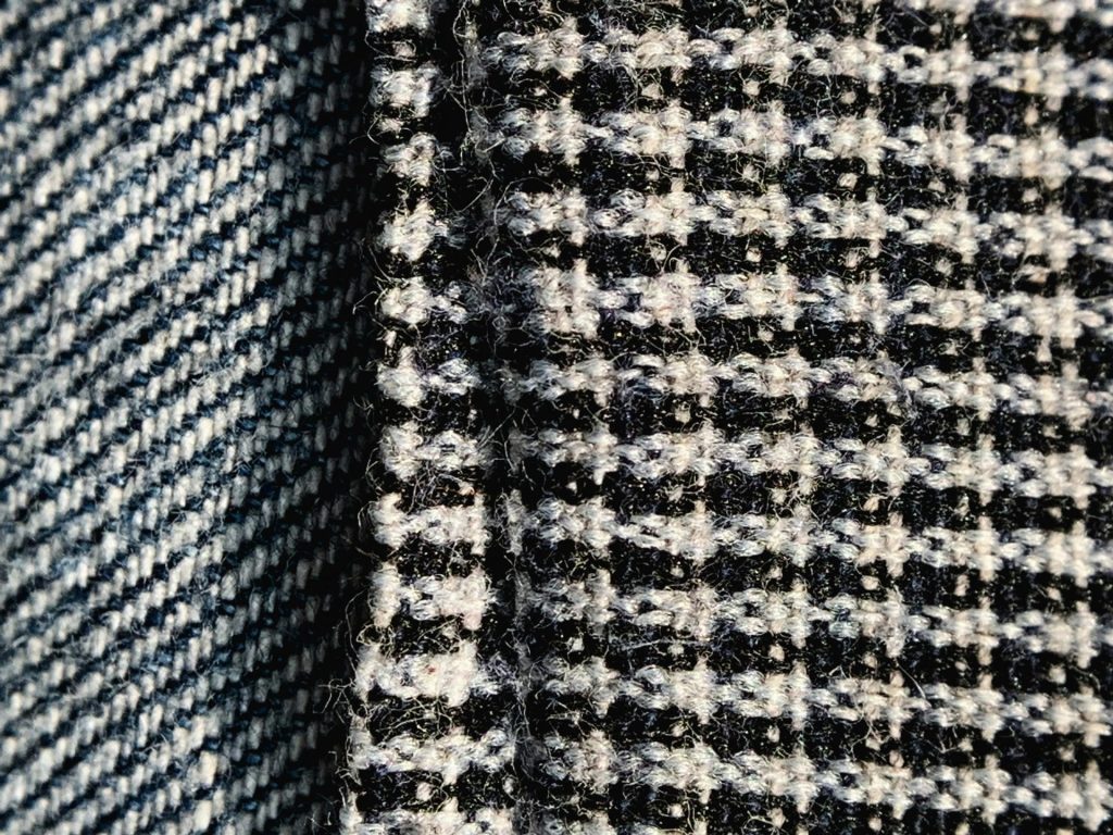 a close up of a black and white checkered fabric